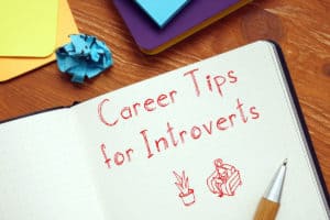 Carrer tips for introverts; image with notebook and text; career tips; introverts;