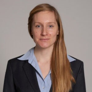 Portrait photo of Laura Kieser on light grey background of Role Model on We Shape Tech website.